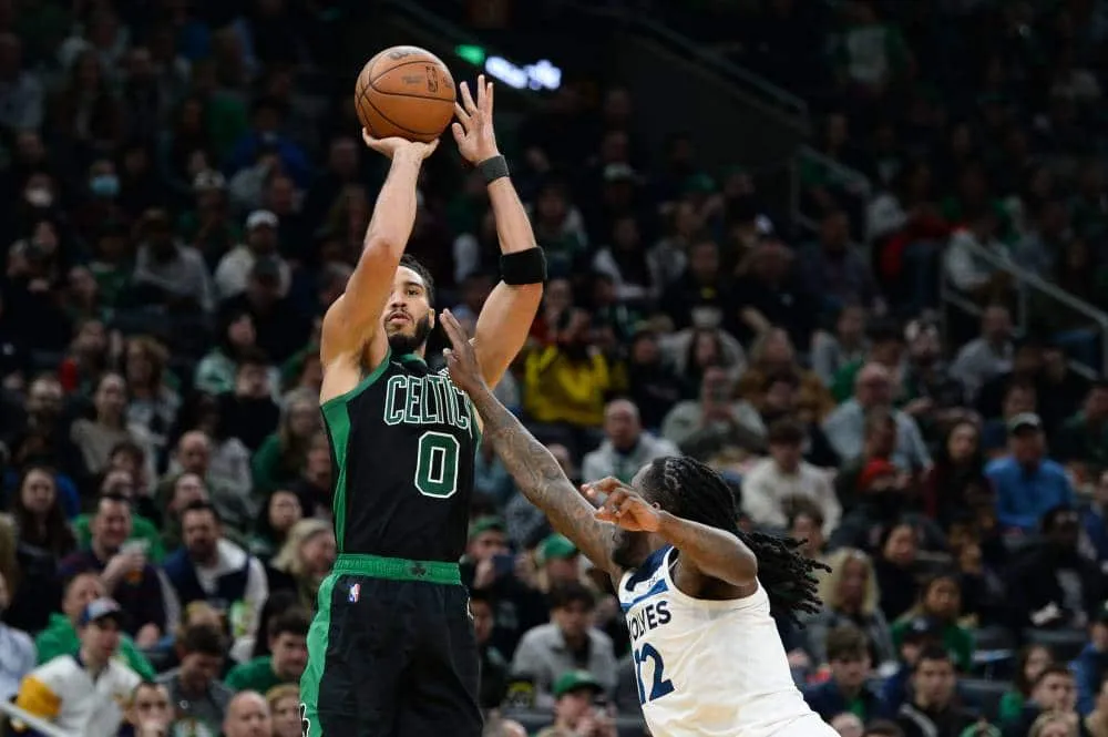 Celtics soar to top; Suns beat Sixers as Irving loses debut