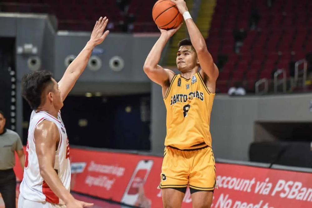 Concepcion catches fire as UST survives UE for first win