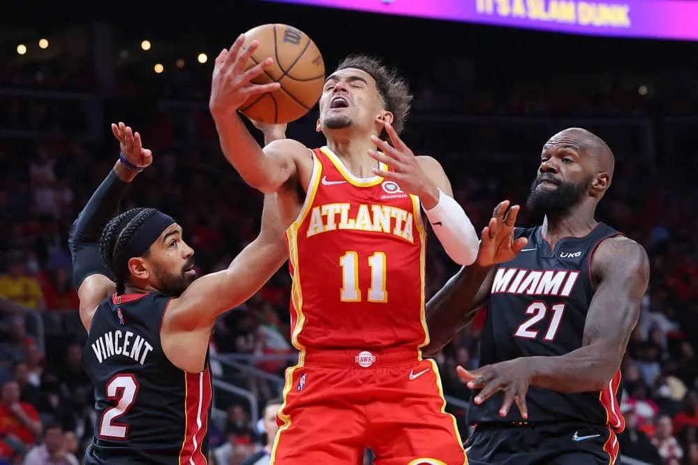 Hawks hold off Heat; Bucks thrash Bulls in NBA playoffs