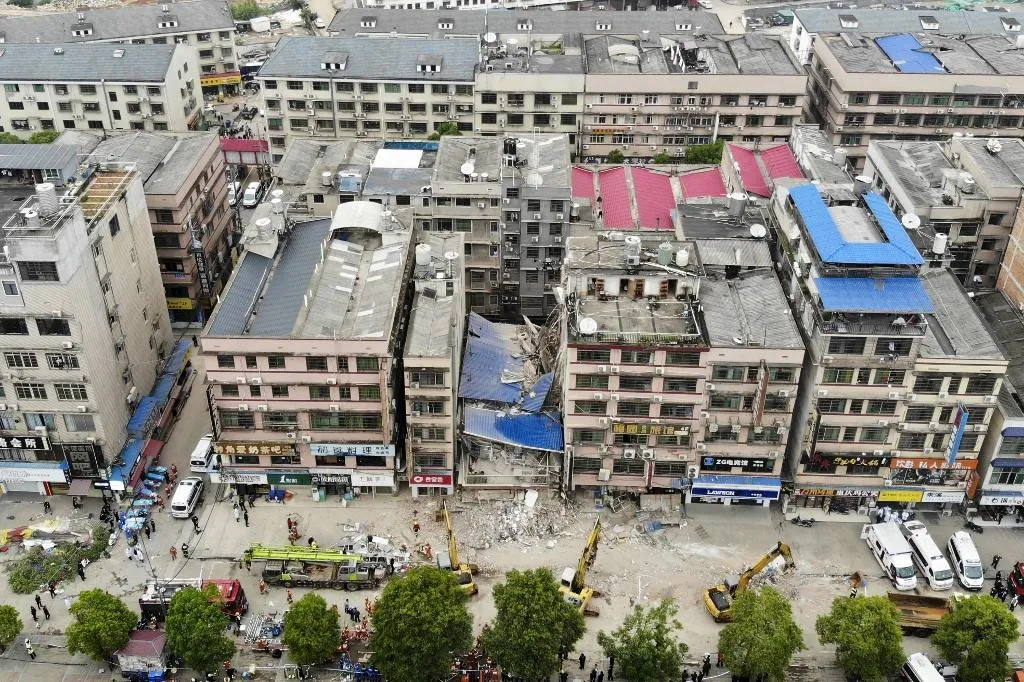 Dozens trapped in China building collapse