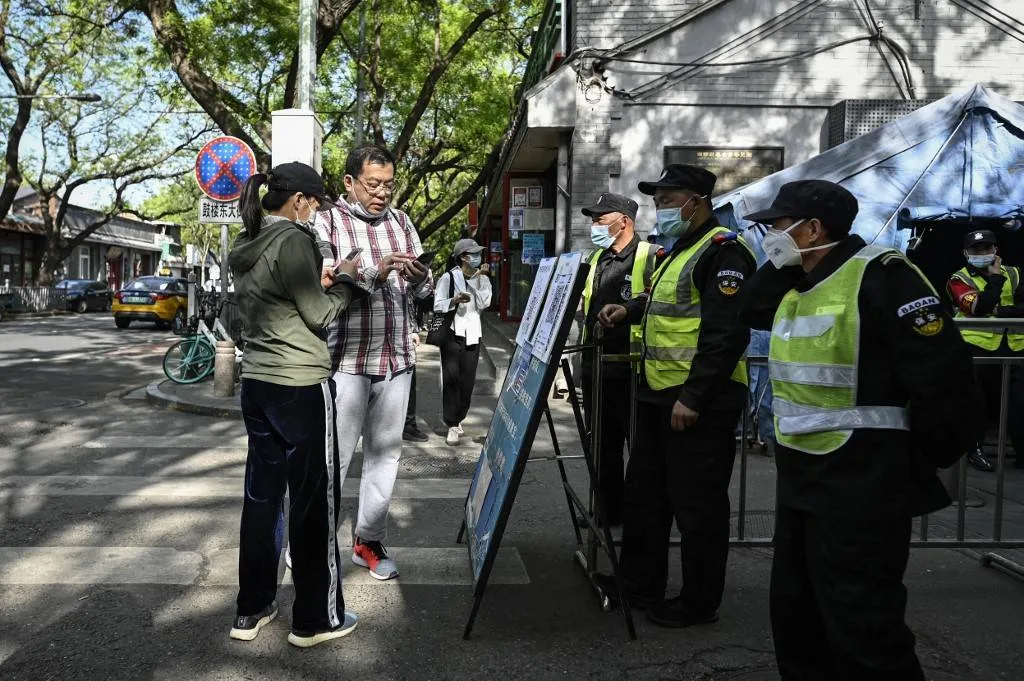 Beijing tightens Covid restrictions as long holiday begins
